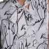 image:imageKarl Lagerfeld Womens Tie Neck Sleeveless Printed BlouseBisqueBlack