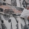 image:imageKarl Lagerfeld Womens Long Sleeve Collared Whimsical All Over Floral Lace Button DownBisqueBlack
